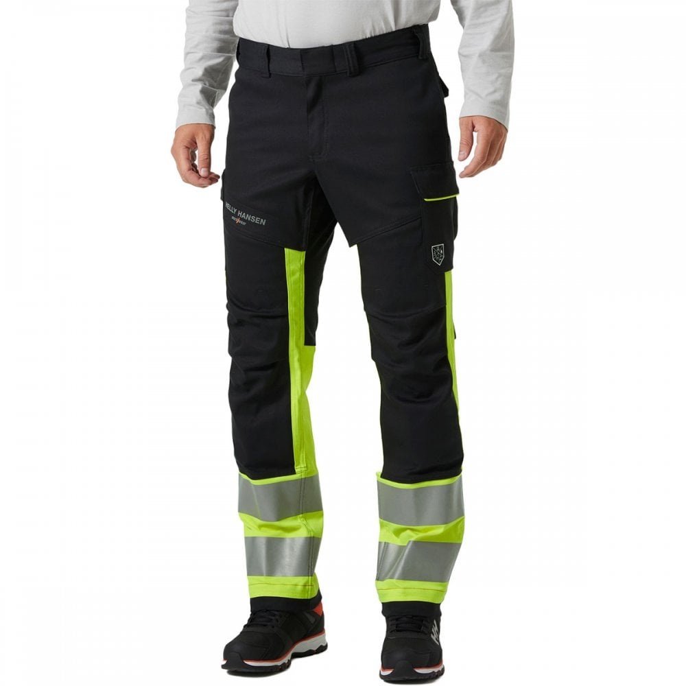 Helly Hansen FYRE WORK Multinorm Inherent püksid Hi-Vis kl.1 põlvekaitse taskutega kollane/must APC1